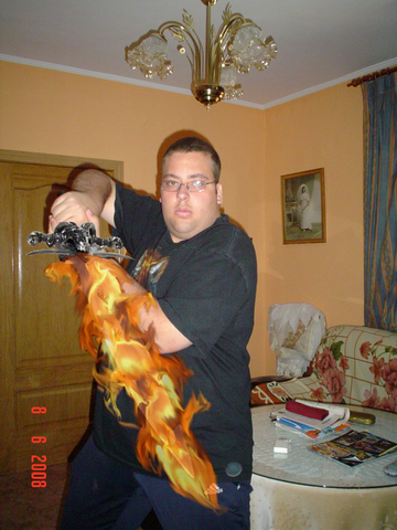 me_with_a_fantasy_fire_sword_by_shaddar_bear.png